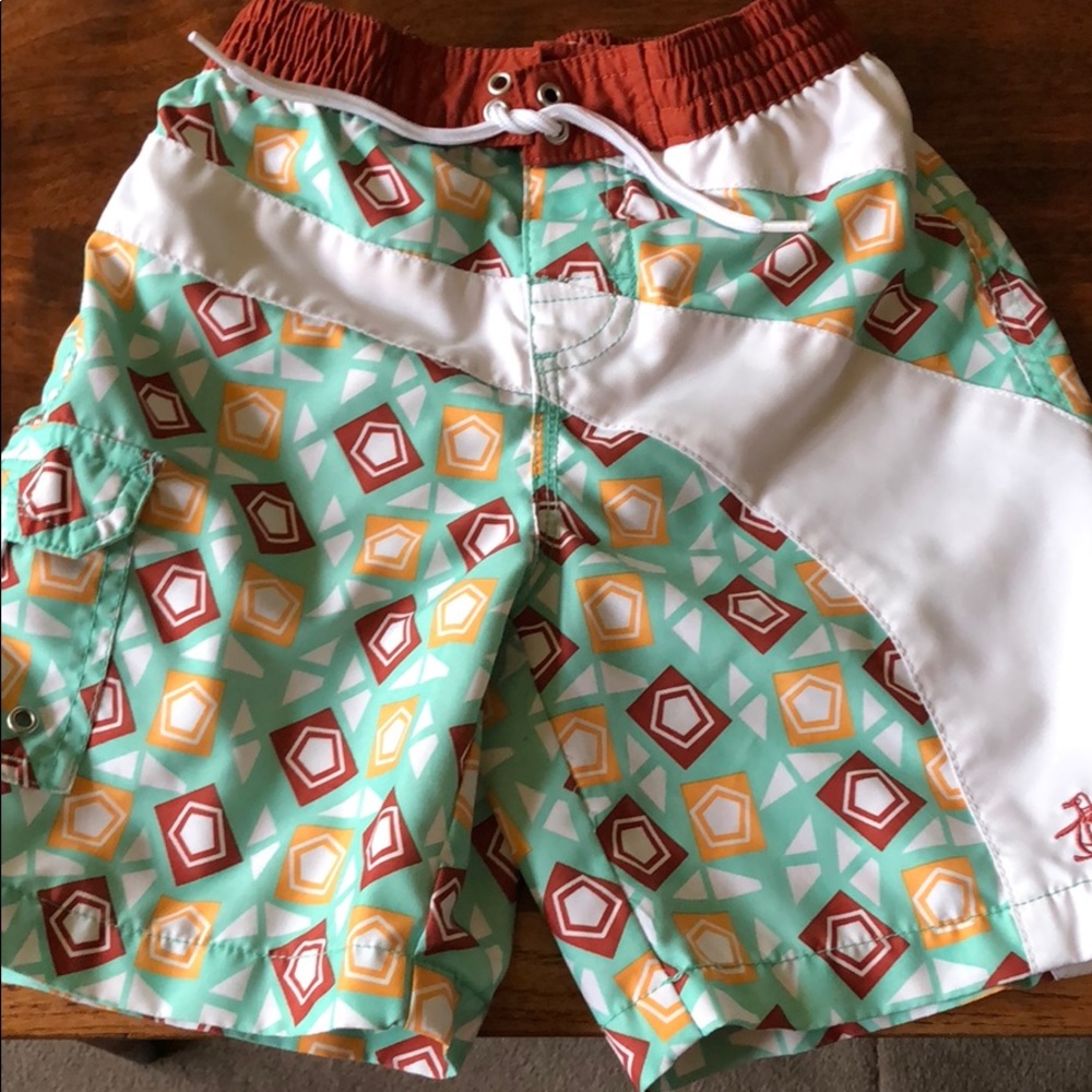 Penguin swim trunks
